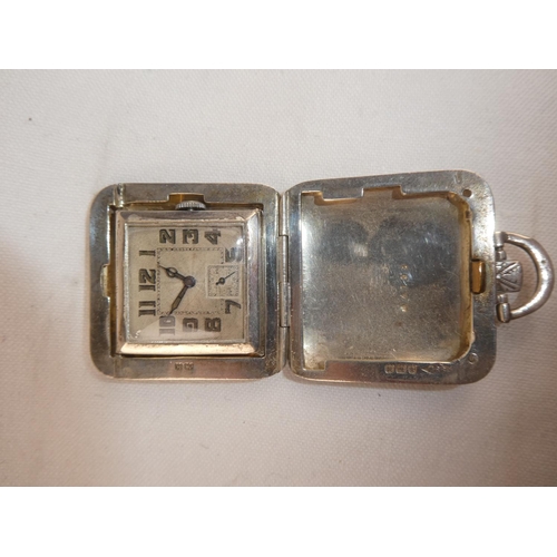 81 - A Sterling Silver watch in a travel case.