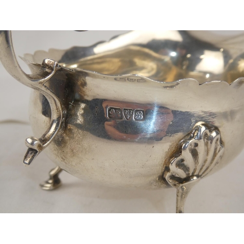 90 - A Sterling Silver sauceboat, weight 157g.