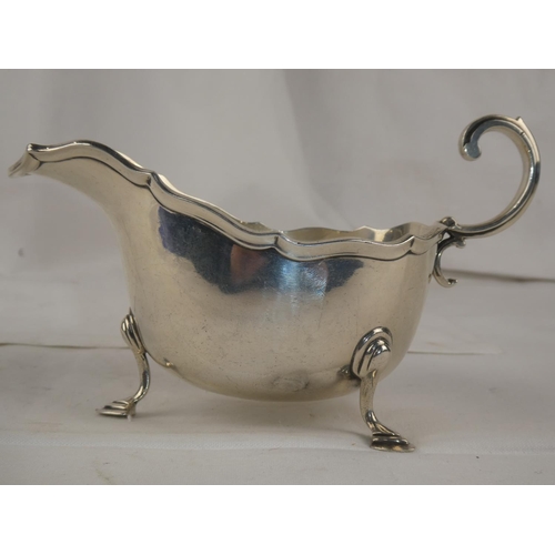 94 - A Sterling Silver sauceboat, engraved and dated 1897 - 1922, weight 207g.