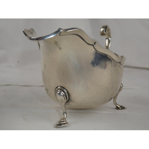 94 - A Sterling Silver sauceboat, engraved and dated 1897 - 1922, weight 207g.