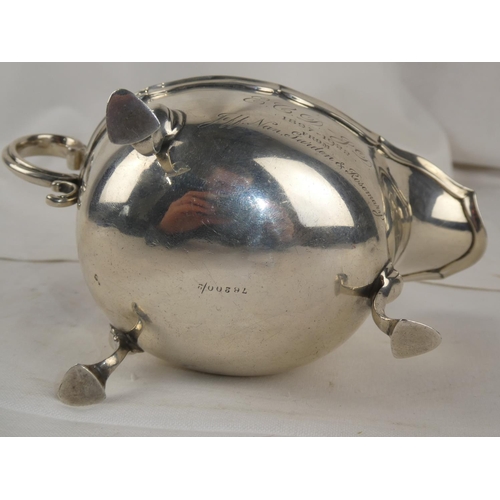 94 - A Sterling Silver sauceboat, engraved and dated 1897 - 1922, weight 207g.