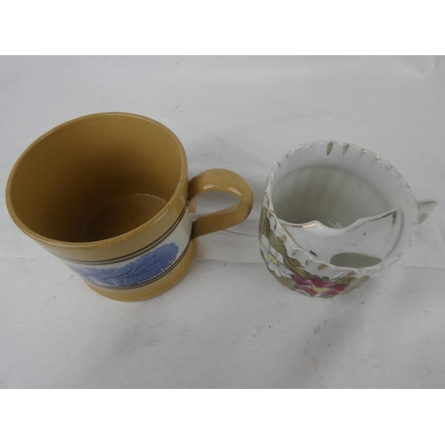 99 - An antique mug and an antique floral patterned moustache cup.