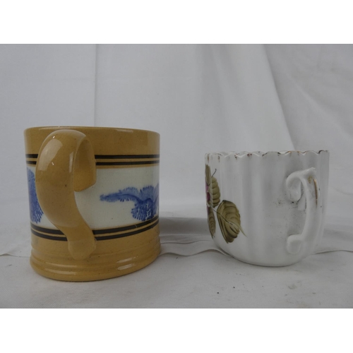 99 - An antique mug and an antique floral patterned moustache cup.