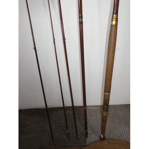 121 - A vintage Hardy 'The Alnwick Greenheart' five piece cane fishing rod and cloth bag.