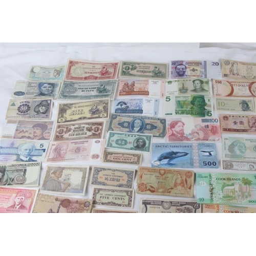 370 - A lot of assorted foreign bank notes to include Kenya, France, Belgium, Hong Kong, China, and lots m... 