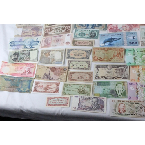 370 - A lot of assorted foreign bank notes to include Kenya, France, Belgium, Hong Kong, China, and lots m... 