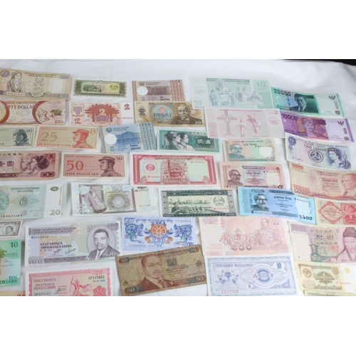 370 - A lot of assorted foreign bank notes to include Kenya, France, Belgium, Hong Kong, China, and lots m... 