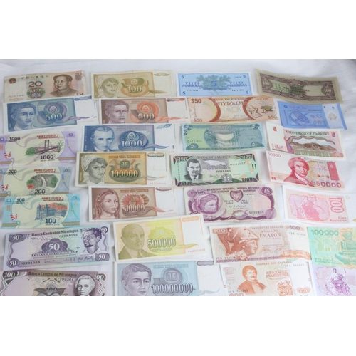 372 - A lot of assorted foreign bank notes from Mexico, China, Burundi, Greece, Cyprus, Jamaica, Iraq, El ... 