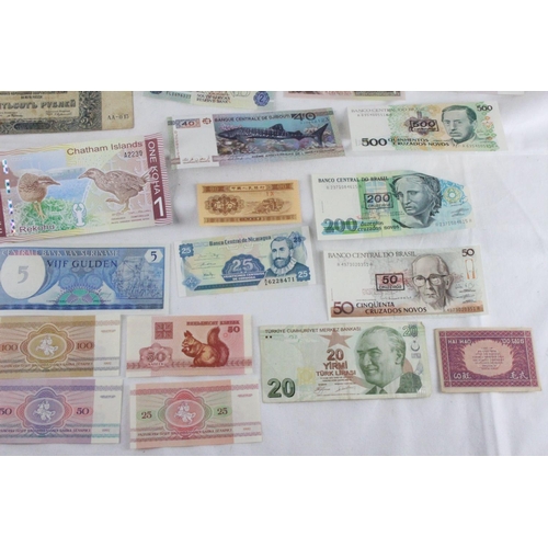 375 - A lot of assorted foreign bank notes from, French China, Turkey, Russia, Bulgaria, Japan, Nepal, Dji... 