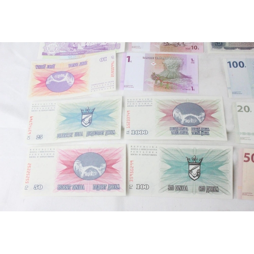 376 - A lot of assorted foreign bank notes from Nicaragua, Bosnia, Congo, British Armed Forces, North Kore... 