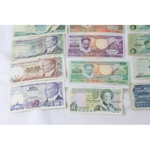 377 - A lot of assorted foreign bank notes from Bolivia, Brazil, Scotland, Jersey, Suriname, Iraq and more... 