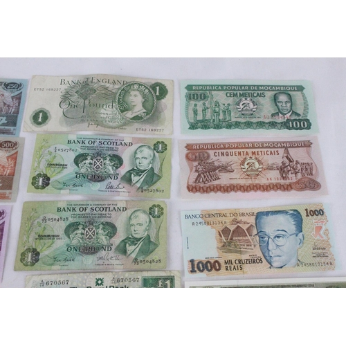 377 - A lot of assorted foreign bank notes from Bolivia, Brazil, Scotland, Jersey, Suriname, Iraq and more... 