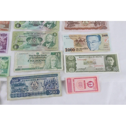 377 - A lot of assorted foreign bank notes from Bolivia, Brazil, Scotland, Jersey, Suriname, Iraq and more... 