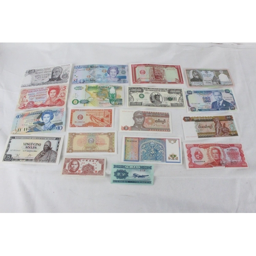 380 - A lot of assorted foreign bank notes from Falkland Islands, Argentina, Caribbean, Zambia, China, Uru... 