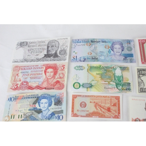 380 - A lot of assorted foreign bank notes from Falkland Islands, Argentina, Caribbean, Zambia, China, Uru... 