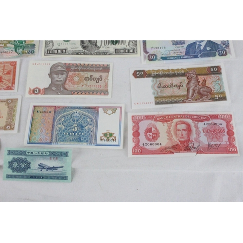 380 - A lot of assorted foreign bank notes from Falkland Islands, Argentina, Caribbean, Zambia, China, Uru... 