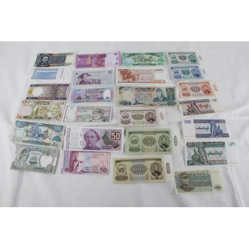 383 - A lot of assorted foreign bank notes from Burma, Mongolia, Pakistan, Greece, Somalia, Haiti, Oman, N... 