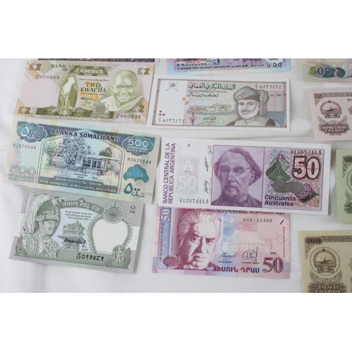 383 - A lot of assorted foreign bank notes from Burma, Mongolia, Pakistan, Greece, Somalia, Haiti, Oman, N... 