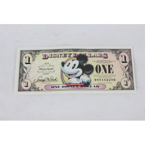 384 - A 2008 Disney dollar.