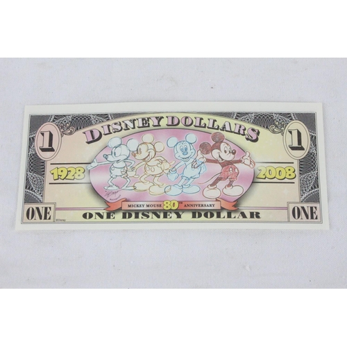 384 - A 2008 Disney dollar.