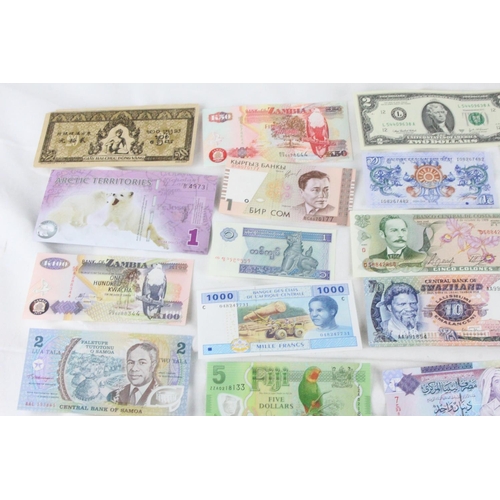 392 - A lot of assorted foreign bank notes from Chad, Mexico, Dominican Republic, Libya, South Africa, Sam... 