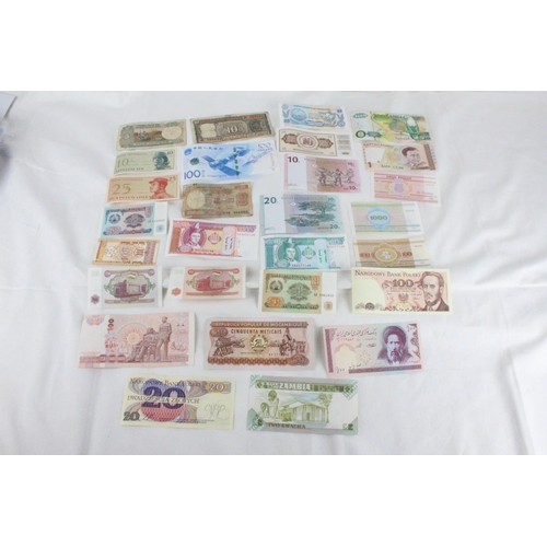 393 - A lot of assorted foreign bank notes from Poland, Zambia, Thailand, Congo, India, China, Indonesia, ... 