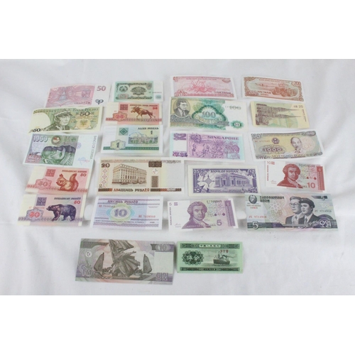 394 - A lot of assorted foreign bank notes from North Korea, China, Croatia, Singapore, Russia, Vietnam, S... 