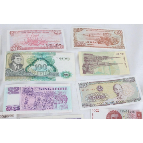 394 - A lot of assorted foreign bank notes from North Korea, China, Croatia, Singapore, Russia, Vietnam, S... 