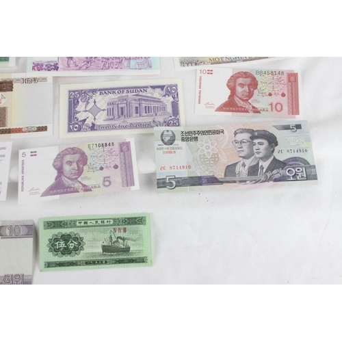 394 - A lot of assorted foreign bank notes from North Korea, China, Croatia, Singapore, Russia, Vietnam, S... 