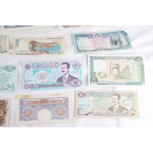 396 - A lot of assorted foreign bank notes from Portugal, England, British Armed Forces, United Kingdom, C... 