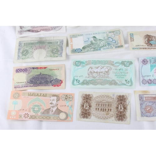 396 - A lot of assorted foreign bank notes from Portugal, England, British Armed Forces, United Kingdom, C... 