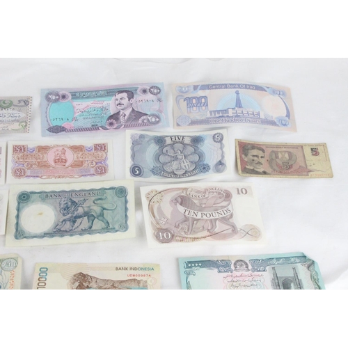 396 - A lot of assorted foreign bank notes from Portugal, England, British Armed Forces, United Kingdom, C... 