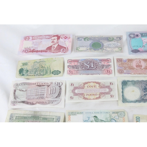 396 - A lot of assorted foreign bank notes from Portugal, England, British Armed Forces, United Kingdom, C... 