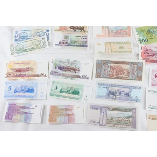 397 - A lot of assorted foreign bank notes from Kadjikistan, Ukraine, Nicaragua, Belarus, Mongolia, Croati... 