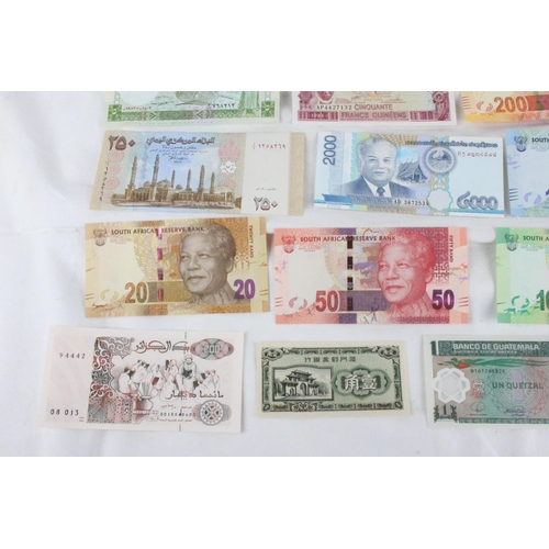 400 - A lot of assorted foreign bank notes from Yemen, Syria, Somalia, Bangladesh, Guinea, Loas, China, Al... 