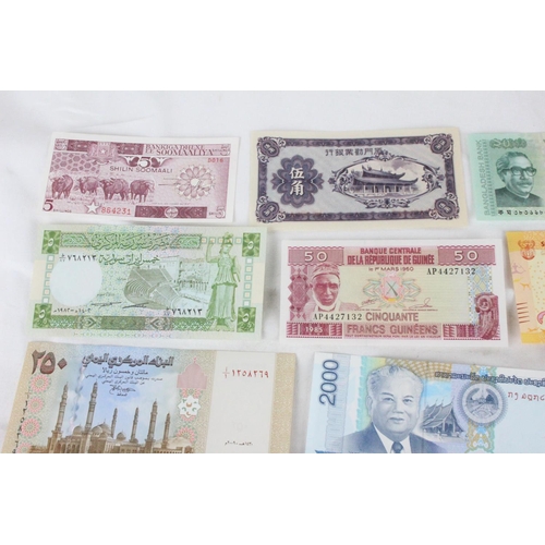 400 - A lot of assorted foreign bank notes from Yemen, Syria, Somalia, Bangladesh, Guinea, Loas, China, Al... 