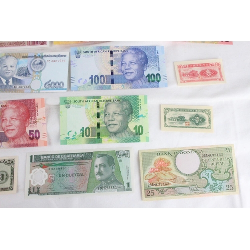 400 - A lot of assorted foreign bank notes from Yemen, Syria, Somalia, Bangladesh, Guinea, Loas, China, Al... 