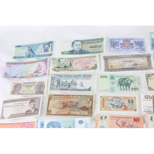 403 - A lot of assorted foreign bank notes from Sri Lanka, Bhutan, Gambia, Pakistan, Spain, Iraq, Canada, ... 