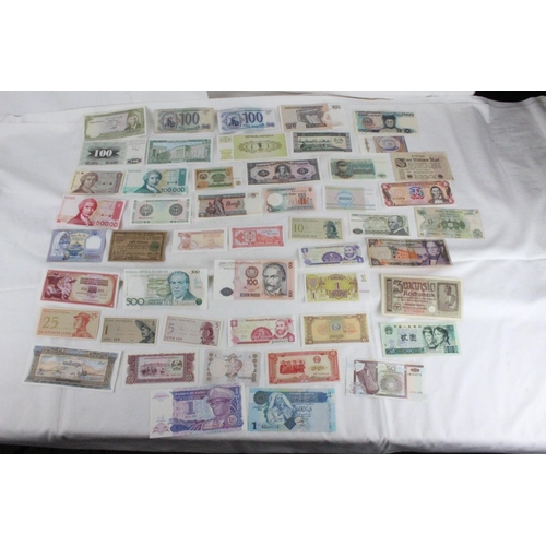 406 - A lot of assorted foreign bank notes from Cambodia, Loas, Latvia, Peru, Indonesia, Ukraine, Ecuador,... 