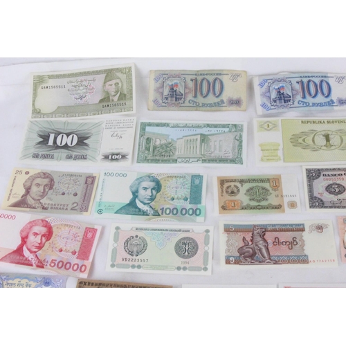 406 - A lot of assorted foreign bank notes from Cambodia, Loas, Latvia, Peru, Indonesia, Ukraine, Ecuador,... 