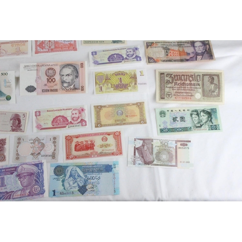 406 - A lot of assorted foreign bank notes from Cambodia, Loas, Latvia, Peru, Indonesia, Ukraine, Ecuador,... 