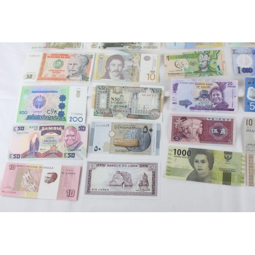 407 - A lot of assorted foreign bank notes from Vietnam, Zimbabwe, Slovenia, Libra, Haiti, Liban, Serbia, ... 