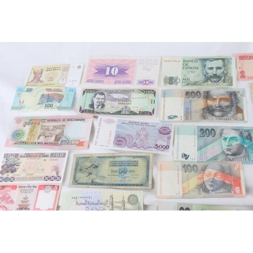 408 - A lot of assorted foreign bank notes from Turkey, Brazil, Tunisia, Italy, Spain, Japan, Denmark, Ger... 