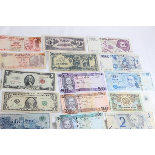 408 - A lot of assorted foreign bank notes from Turkey, Brazil, Tunisia, Italy, Spain, Japan, Denmark, Ger... 