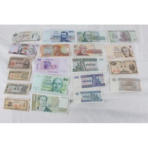 410 - A lot of assorted foreign bank notes from Zimbabwe, Myanmar, Bulgaria, Israel, New Zealand, Japan an... 