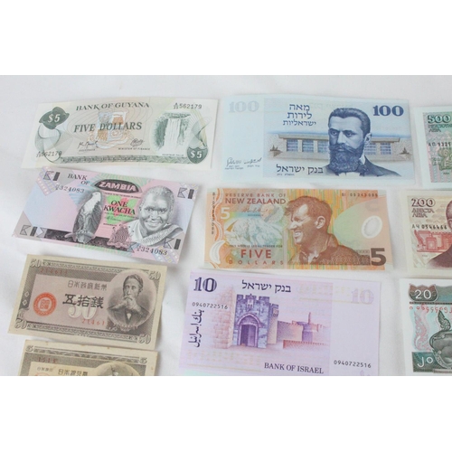 410 - A lot of assorted foreign bank notes from Zimbabwe, Myanmar, Bulgaria, Israel, New Zealand, Japan an... 