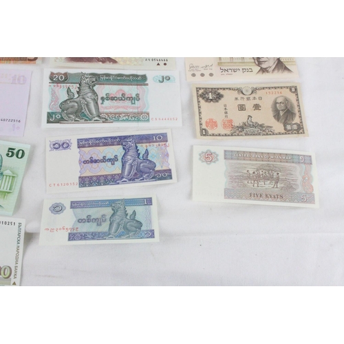 410 - A lot of assorted foreign bank notes from Zimbabwe, Myanmar, Bulgaria, Israel, New Zealand, Japan an... 