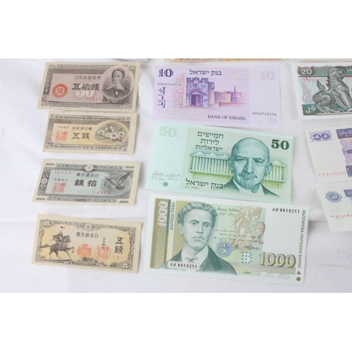 410 - A lot of assorted foreign bank notes from Zimbabwe, Myanmar, Bulgaria, Israel, New Zealand, Japan an... 