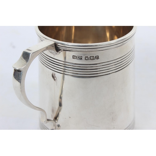 78 - A Sterling Silver tankard 'June', hallmarked for Sheffield, weighs 104g, produced by Gladwin Ltd.