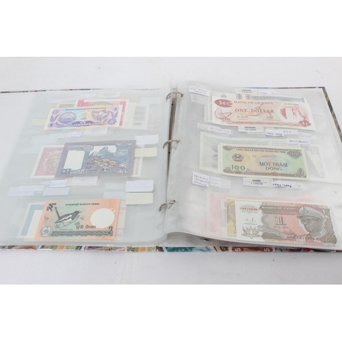 99 - 'Money of the World' folder containing bank notes from Indonesia, Croatia, Hong Kong and more.